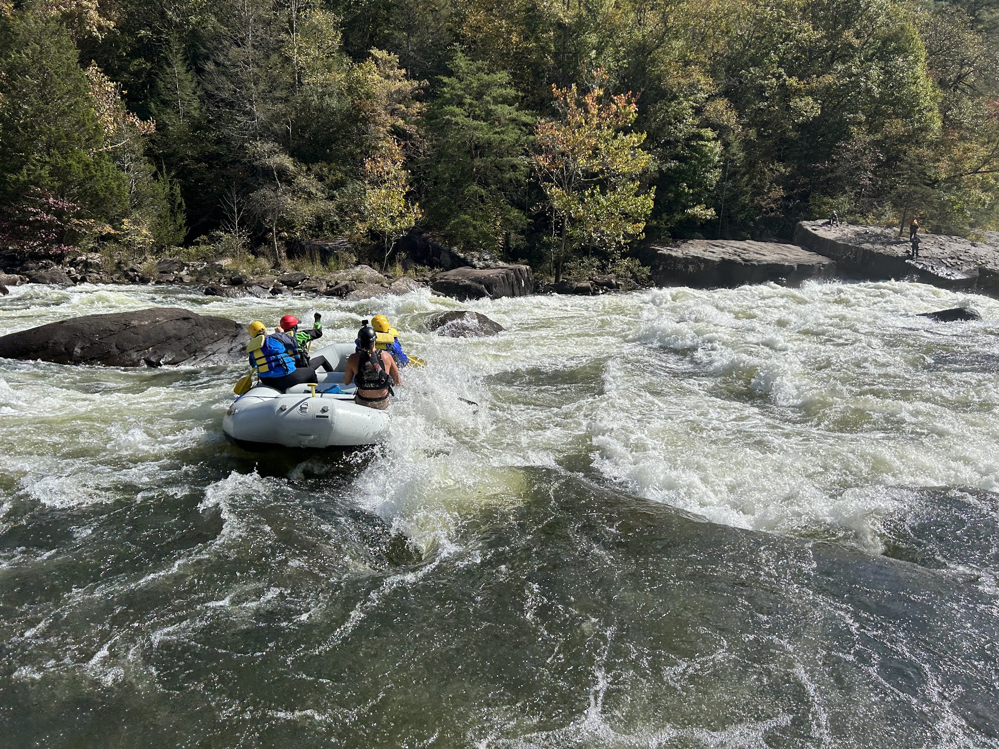 #14 Upper Gauley Marathon a small boat in a body of water
