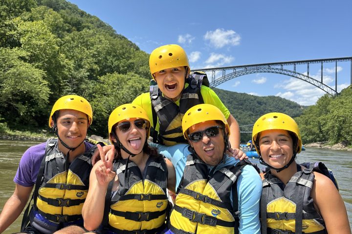 a group of people sitting posing for the camera