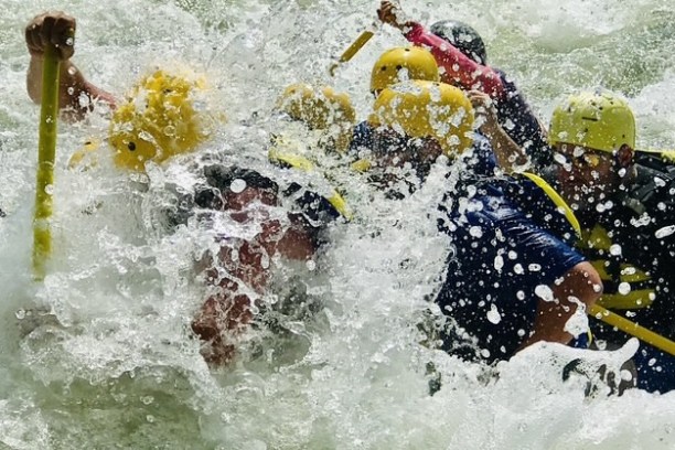 a person riding a surfboard in the water