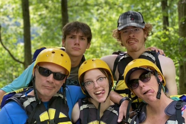 a group of people wearing rafting gear