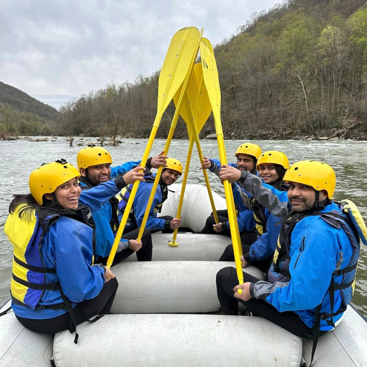 a couple of people that are sitting on the side of the road