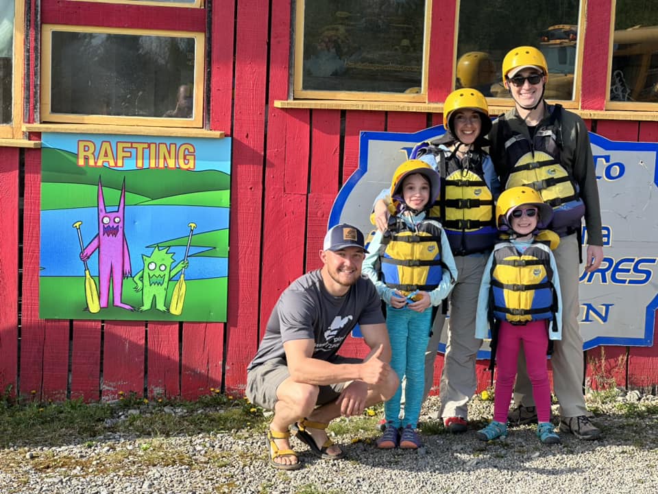a group of people posing for the camera