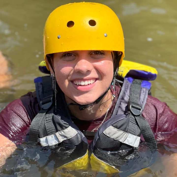a little boy wearing a hat