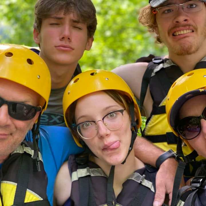 a group of people posing for the camera