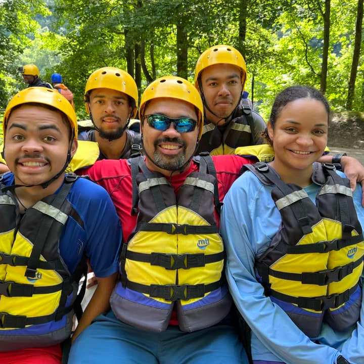 a group of people posing for the camera