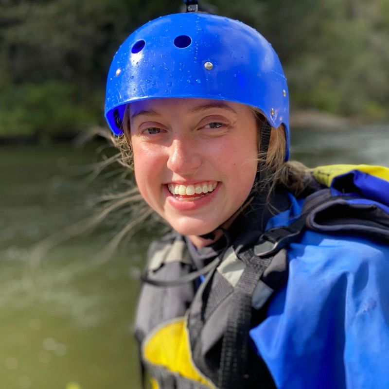 a young boy wearing a blue hat