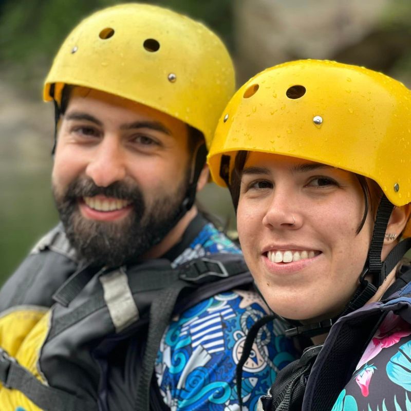 a boy wearing a hat and smiling at the camera