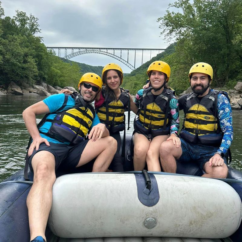 a group of people sitting posing for the camera
