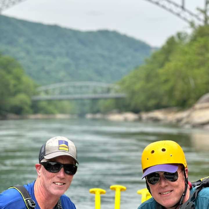 a group of people on a bridge