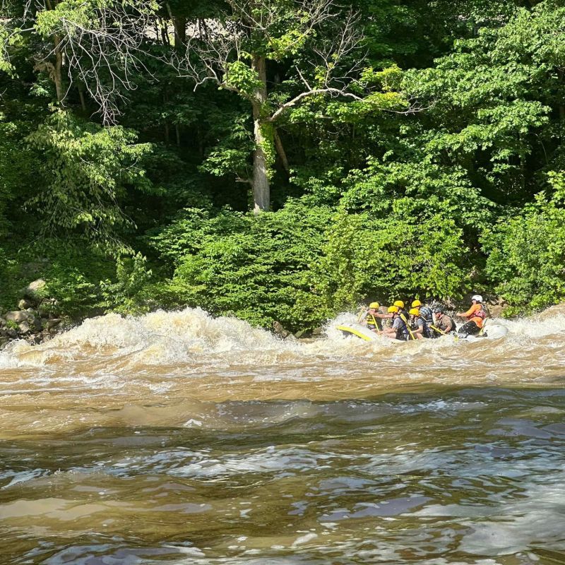 a group of people in a body of water