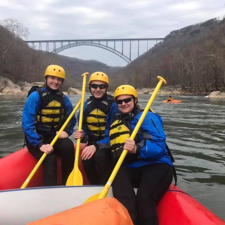 a man in a raft on the water
