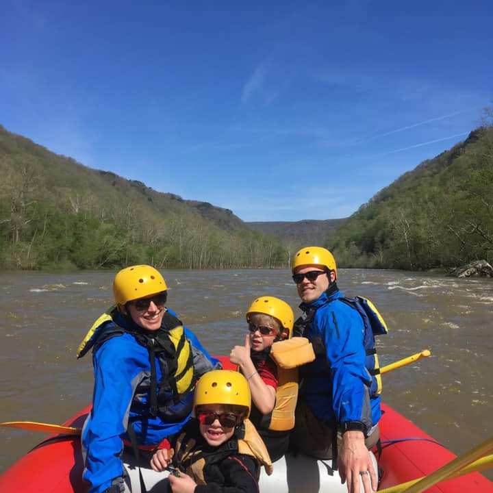 a group of people on a raft