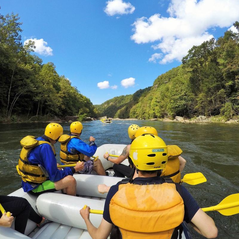 a group of people on a raft