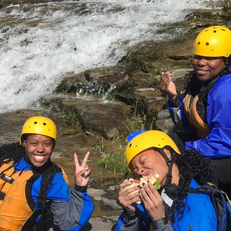 a young boy wearing a helmet