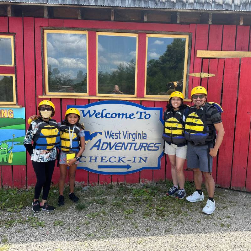 a group of people standing in front of a building