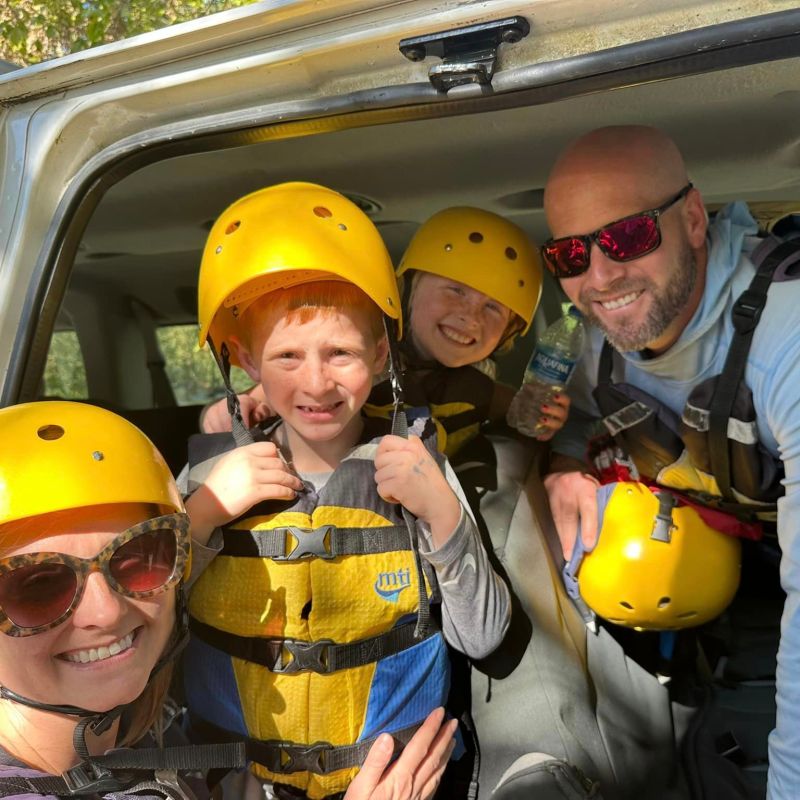 a couple of people that are sitting on a motorcycle