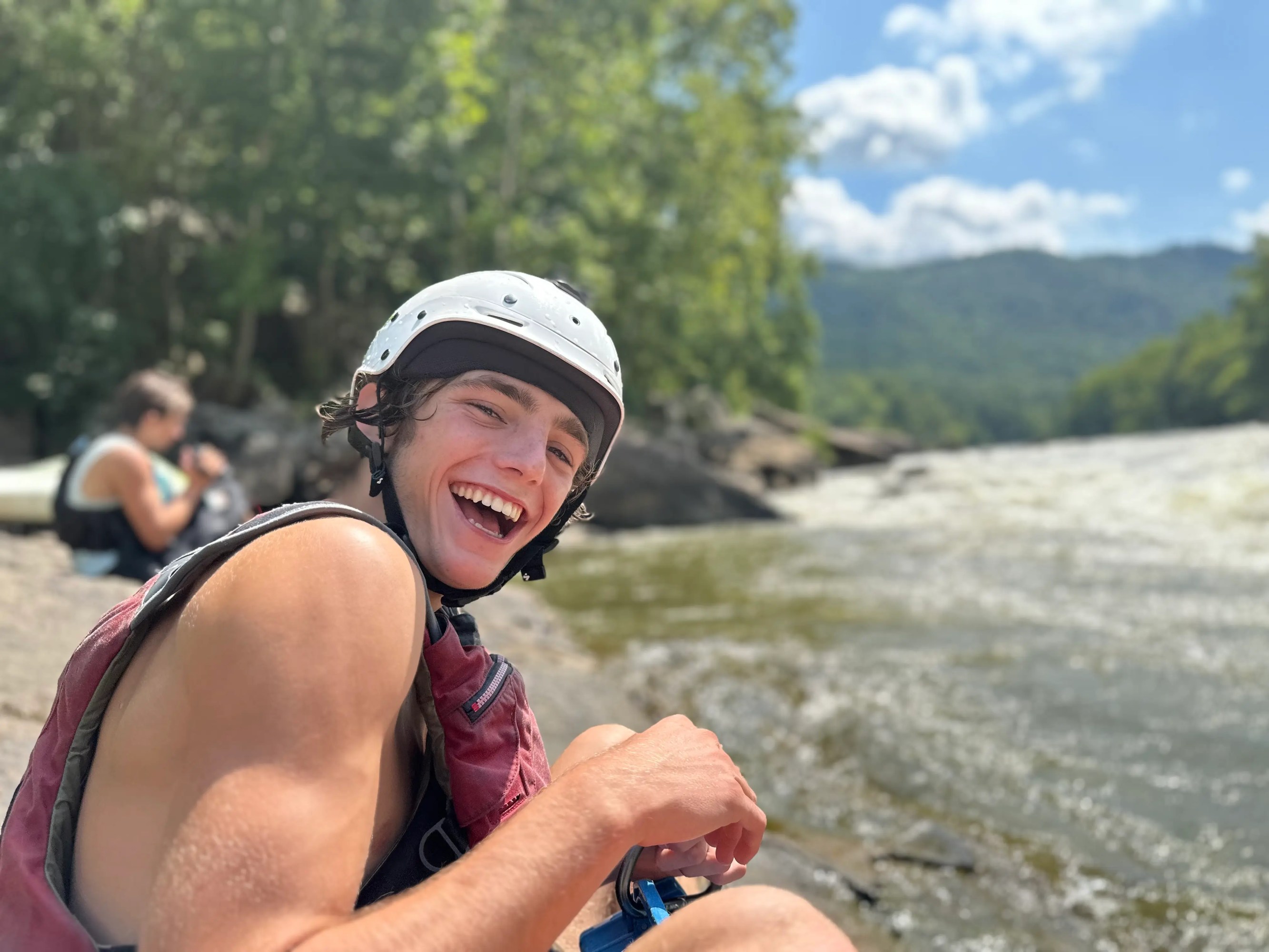 a person sitting at a beach
