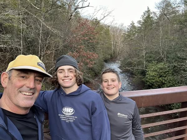 a group of people posing for the camera