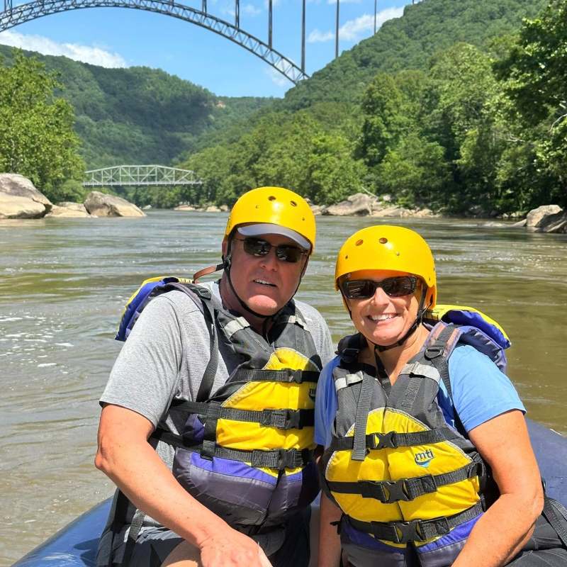 a group of people riding on the back of a boat
