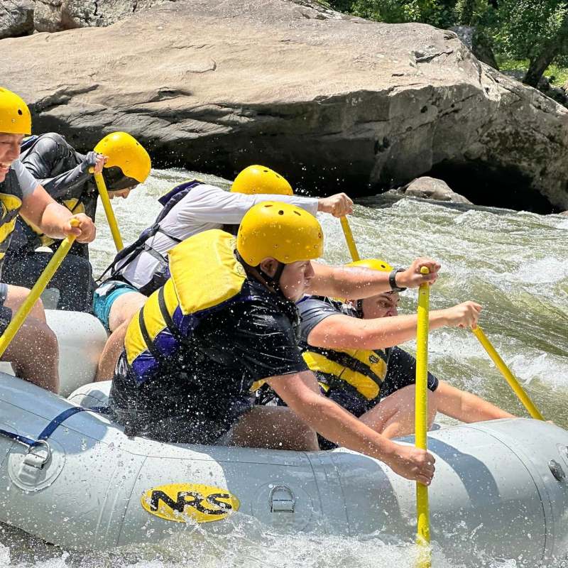 a man sitting on a raft