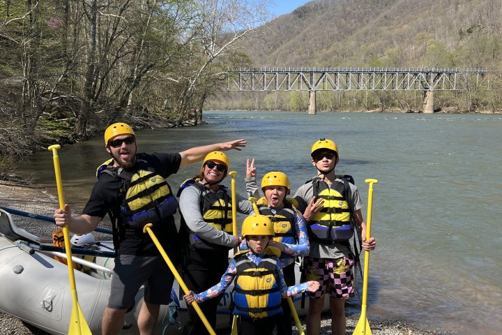 a group of people riding skis on a lake