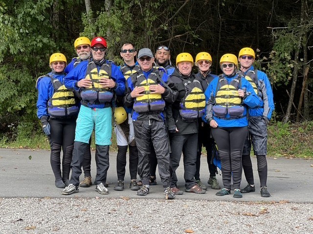 a group of people posing for the camera