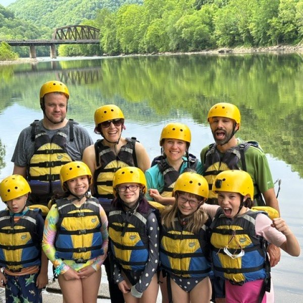 a group of people posing for the camera