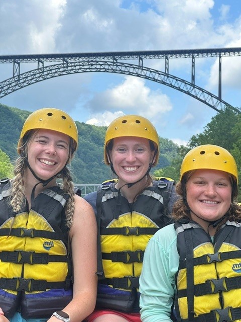 a group of people posing for the camera