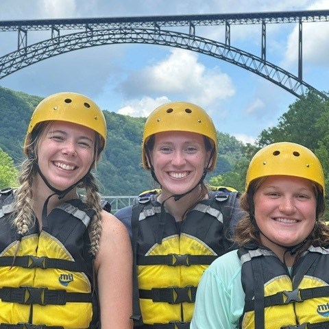 a group of people posing for the camera