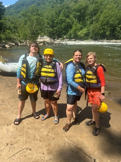 a group of people posing for the camera